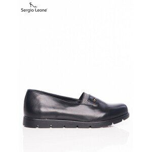 Black Sergio Leone shoes on a slight increase