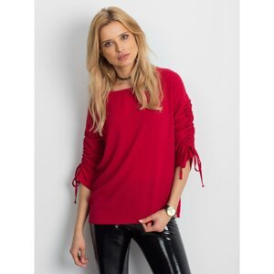 Red blouse with draped sleeves