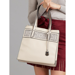 Beige bag with geometric application