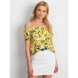 Hispanic white and yellow blouse with flowers