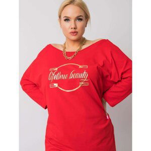 Red cotton blouse with an application