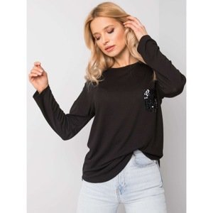 Women´s black blouse with applications