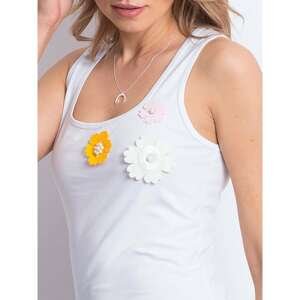 White top with floral patches