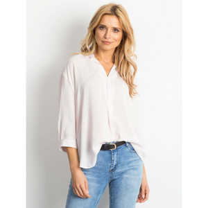 Light pink blouse with a loose cut