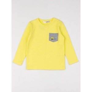 Yellow baby blouse with a pocket