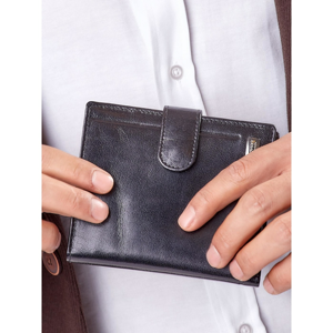 Black leather wallet fastened with a snap