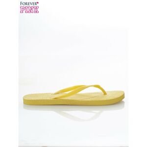 Fashionable and comfortable yellow women´s flip-flops for the beach