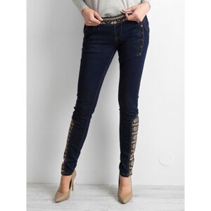Women´s jeggings with ethnic inserts in dark blue color