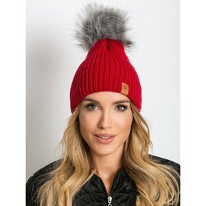 Red cap with a pompom