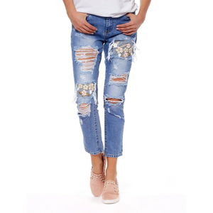 Blue jeans with holes and floral embroidery