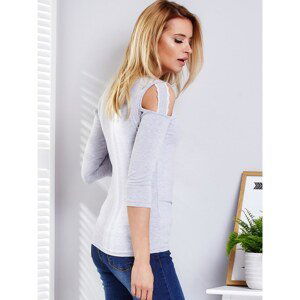 Light gray women´s blouse with cutouts