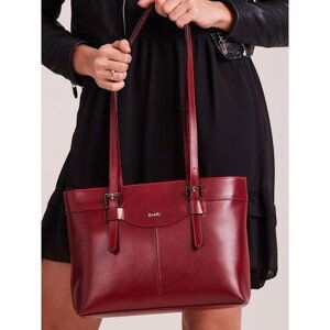 An elegant cherry leather handbag