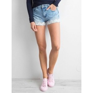 Blue denim shorts with an application