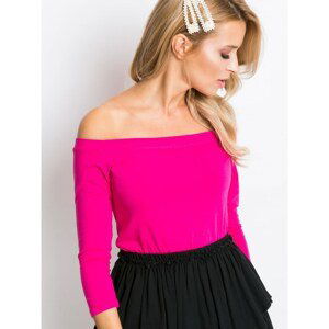 Fuchsia blouse on shoulder