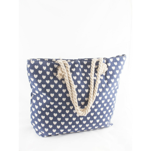 A large marine bag with a pattern of hearts, navy blue