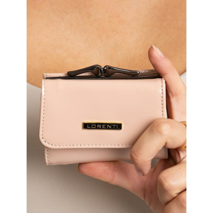 A small, dirty pink women´s wallet