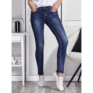 Blue women´s jeans with a frayed hem