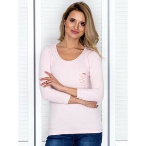 Light pink blouse with cutouts at the back
