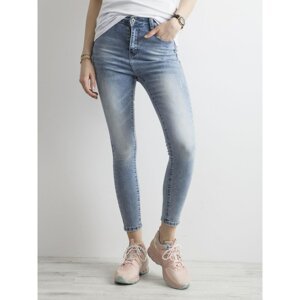 Women´s jeans with a washed-out blue effect