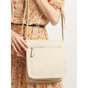 A bag with a flap made of eco-leather, light beige