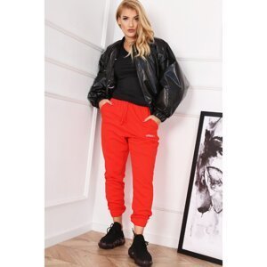 Patent leather bomber jacket with a bat-like cut