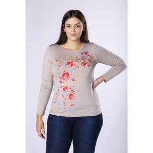 fitted blouse with a floral print on the front