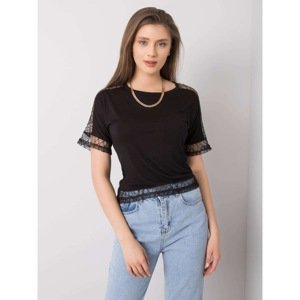 Black blouse with decorative inserts