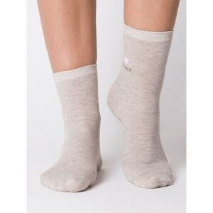 Beige socks with shiny thread
