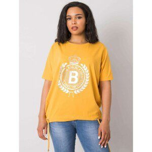 Yellow plus size women's blouse with a print