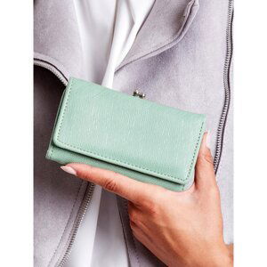 Women's green wallet with a compartment for earwires