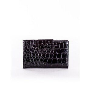 Women's black embossed wallet with a flap