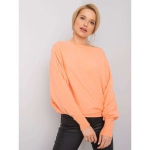 Peach-colored loose sweater