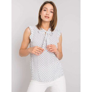 White polka dot blouse with a tie