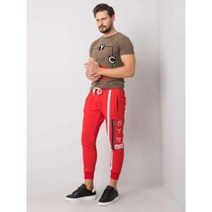 Men's red sweatpants with a print