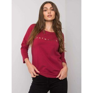 Ladies' maroon blouse with the inscription