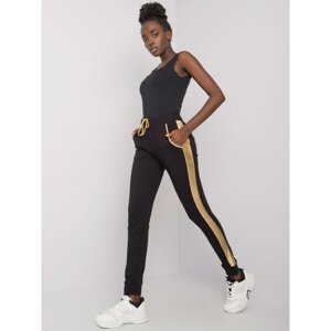 Women's black and gold tracksuits