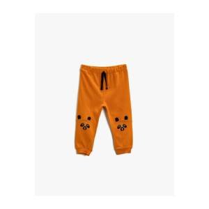 Koton Animal Patterned Cotton Sweatpants with a lace-up waist and elasticated legs.