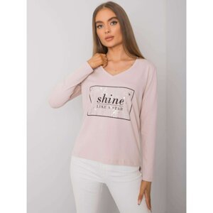 Light pink women's long sleeve shirt with a print