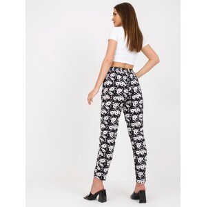 Black light trousers made of fabric with SUBLEBEL flowers