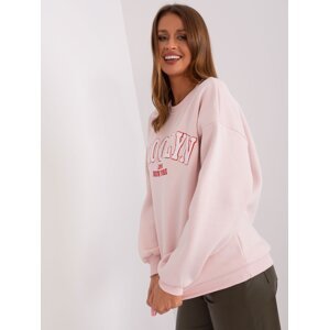Light pink oversize sweatshirt with inscription