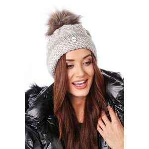 Beige winter cap with braids and pompom