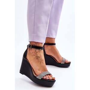 Fashionable leather sandals on a wedge black Arwen