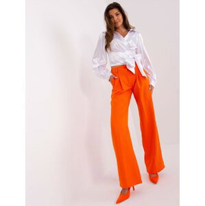 Orange suit trousers with pockets