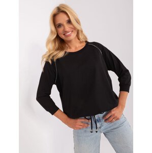 Lady's black casual blouse with trim