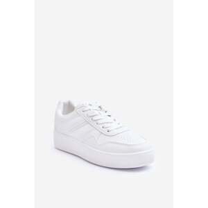 Women's sports shoes on a platform white pudding