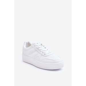 Women's sports shoes on a platform white pudding