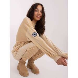 Beige women's velour set with trousers