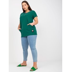 Dark green blouse of larger size with lettering at the neckline