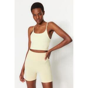 Trendyol Pastel Yellow Crop Sports Blouse with Light Support and Reflective Print Detail