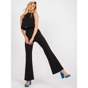 Elegant black ensemble with high-waisted trousers